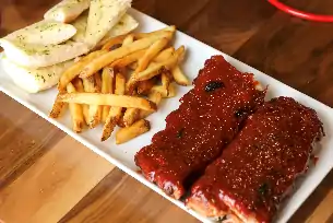 Order Ribs  food online from Charlie Foxe's Pizza store, St. Charles on bringmethat.com