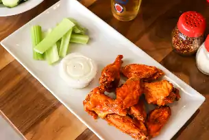 Order Chicken Wings food online from Charlie Foxe's Pizza store, St. Charles on bringmethat.com