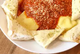 Order Cheese Ravioli food online from Charlie Foxe's Pizza store, St. Charles on bringmethat.com